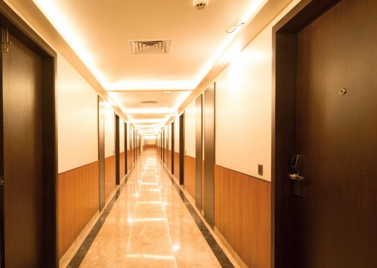 Hotel Central Park Manipal Bagian luar foto