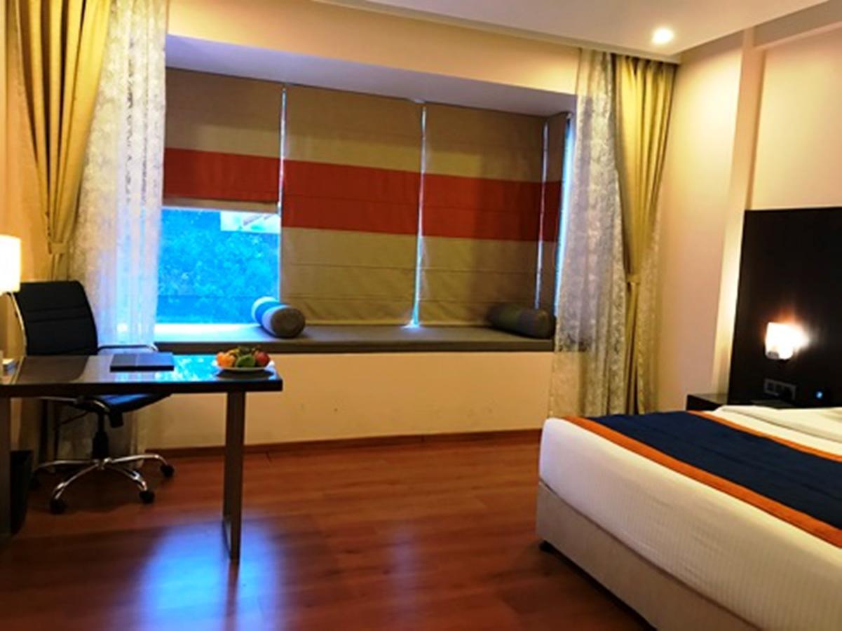 Hotel Central Park Manipal Bagian luar foto